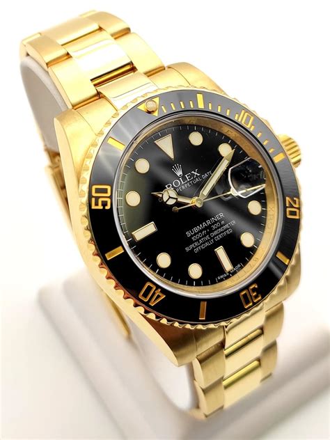 rolex submariner solid gold used|gold submariner Rolex price.